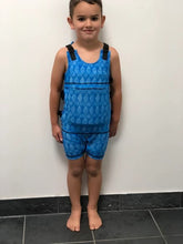 boy in blue orca swim trainer
